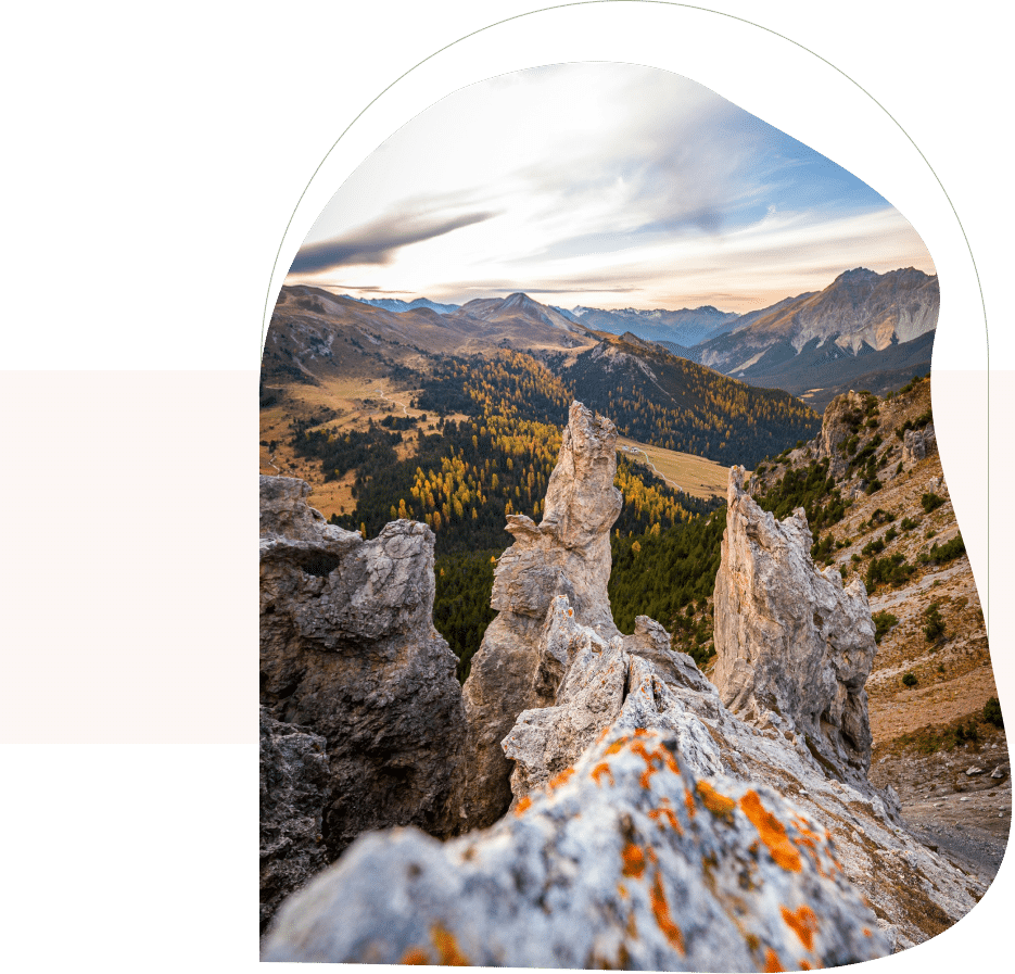 Rocky mountain view with open valley, representing new perspective and calm with an anxiety therapist in San Francisco.