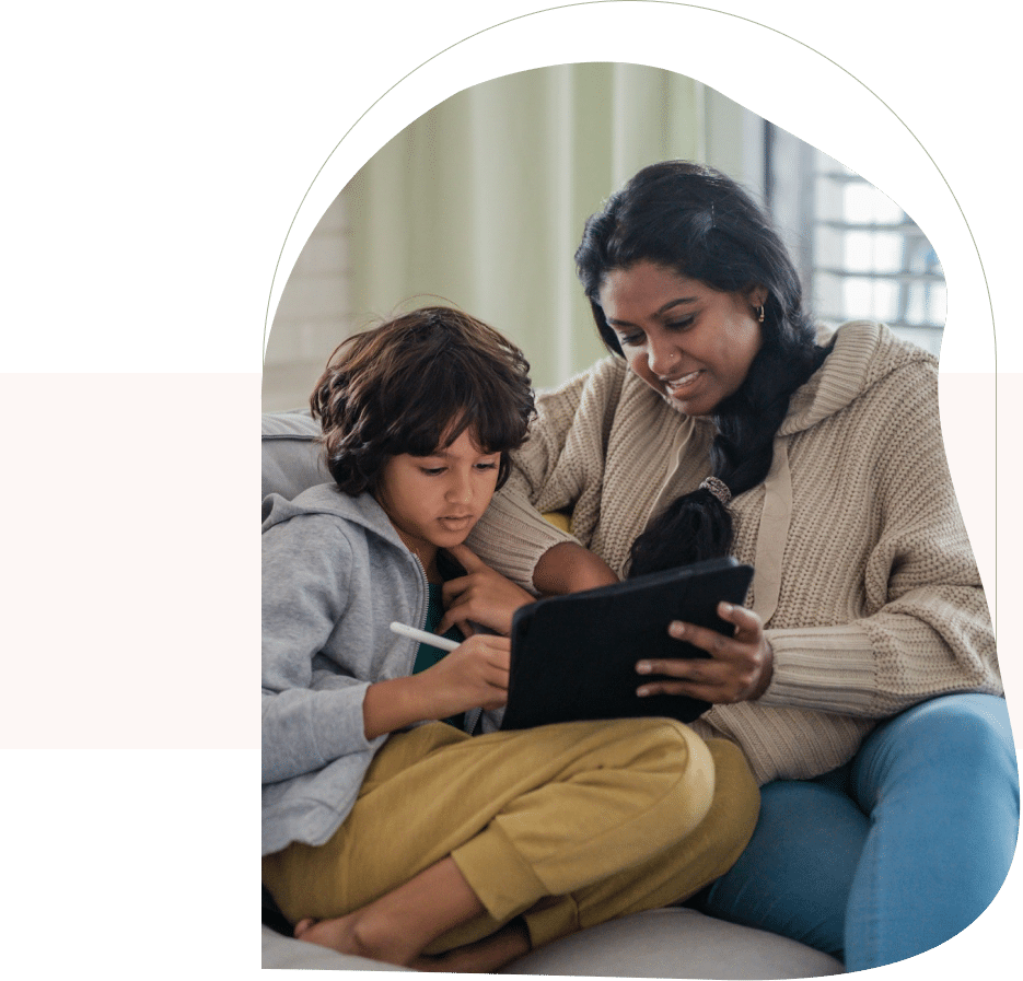 Mom and child using tablet together, showing connection nurtured by parent therapist San Francisco.