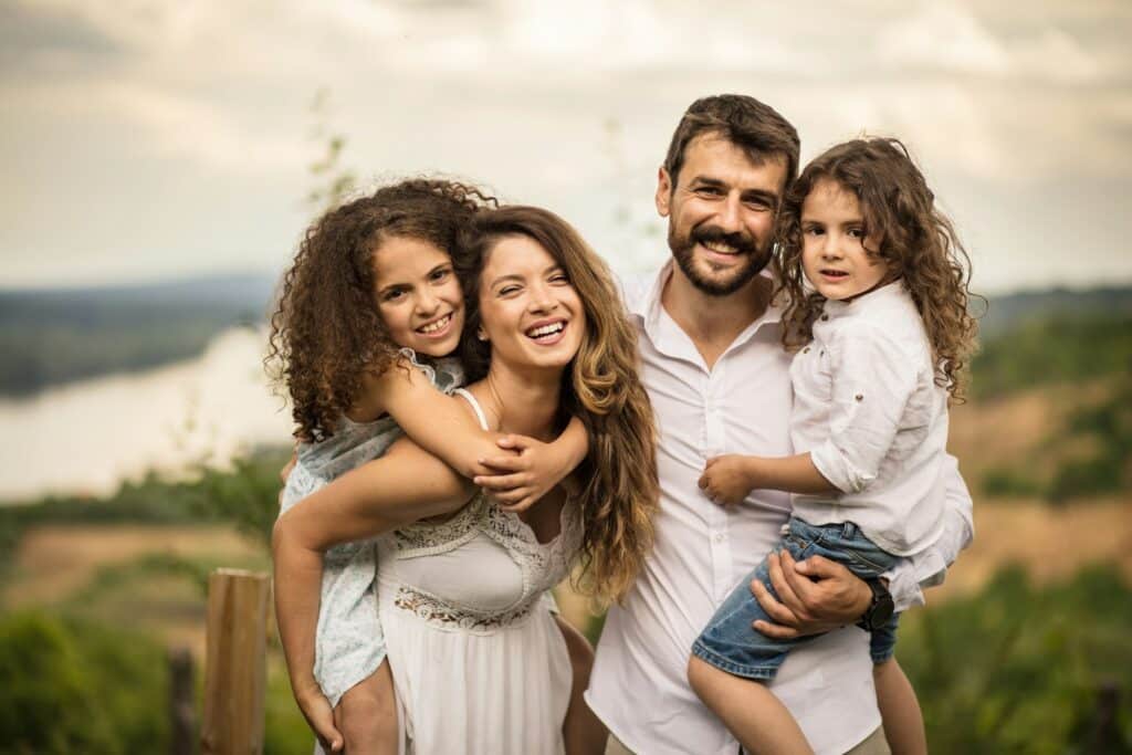 Parents and kids enjoying time together, guided by family therapist near San Francisco.